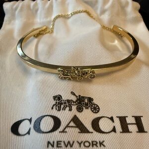 Coach Gold-Tone Horse & Carriage Slim Bangle